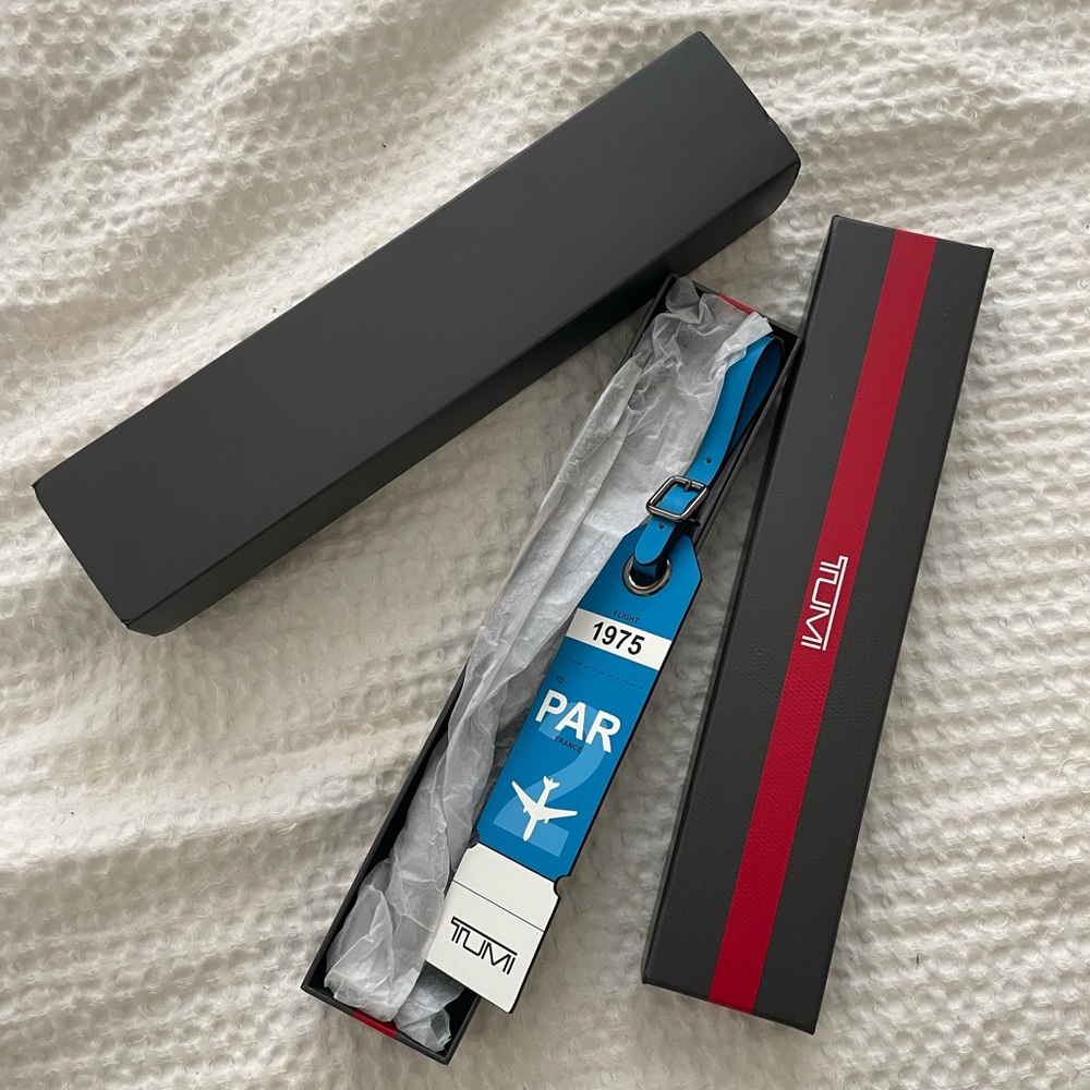 TUMI luggage tag